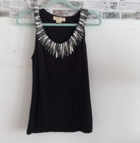 Elegant Black Sleeveless Top with Embellished Neckline - Picture 1 of 8